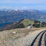 Photo 10: The ascent trail met the cogwheel railway tracks on the ridge - view of Lake Wolfgangsee and the surrounding mountains