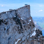Photo 20: Aerial view of the steep rocky cliffs of Schafberg with the observation deck and hotel