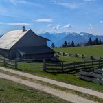 Photo 5: Wooden alpine hut at Schafbergalm with a view of the snow-capped Alpine peaks